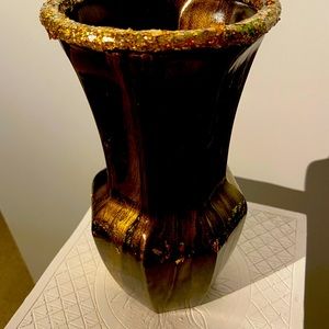 I hand make or hand paint vases. I have about 100 vases all custom painted.